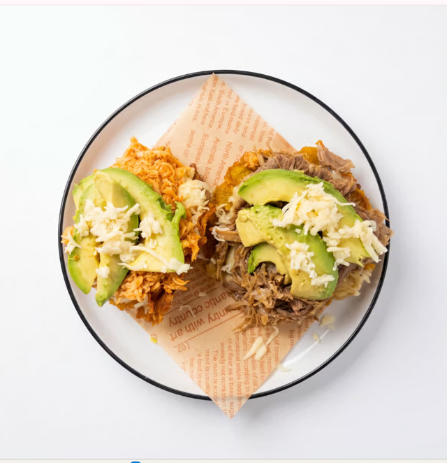 Pollo Mechado Tostones.