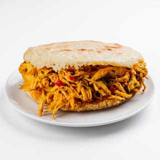 Pollo Mechado Arepa